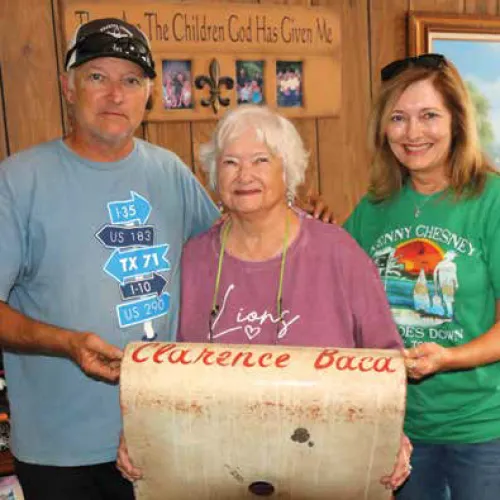 Clarence Baca's sister Rose Marie Baca Rohde (center) with her children Jimmy Rohde and Shannon Gerik.