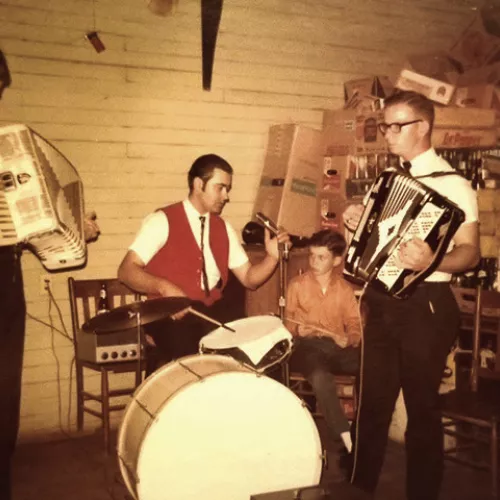 The Red Ravens during their early years, playing in front of a stack of beer crates. Photo courtesy of Joyce Rybak