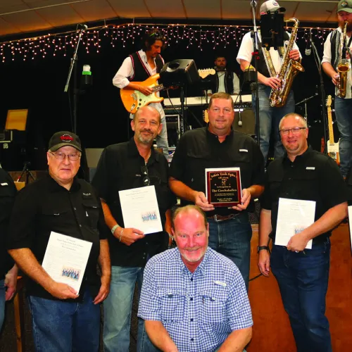 The Czechaholics were inducted into the South Texas Polka Hall of Fame at the 45th Annual South Texas Polka and Sausage Festival in Hallettsville last month. Picture are (back, from left) James Marek, Mayo Walker, Brian Svetlik, Mark Hermes, Brian Klekar, Eugene Klekar, (front) Greg Svetlik.