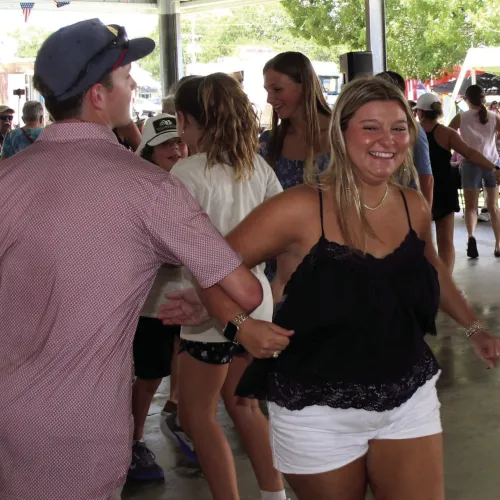 Dancers at the Moulton Jamboree spin around to the music of the Shiner Hobo Band.